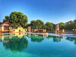 Отель Gir Lions Paw Resort with Swimming Pool  Sasan Gir